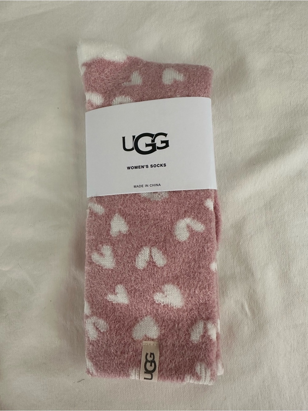 UGG Women's Pink and White Heart Fuzzy Socks